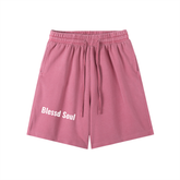 Vintage Wash Logo Shorts in soft pink color with an elastic waistband and side pocket for relaxed streetwear style.