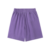 Vintage Wash Logo Shorts in purple, featuring a relaxed fit and pocket, perfect for casual streetwear style.