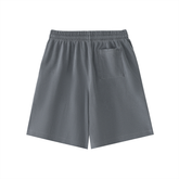 Vintage Wash Logo Shorts in soft deep blue color with an elastic waistband and side pocket for relaxed streetwear style.